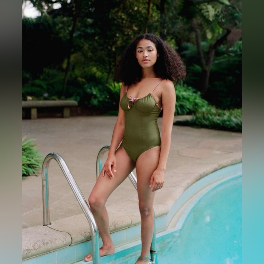 Christy Dawn Kinsley One Piece Swimsuit in green and pink detailing.
